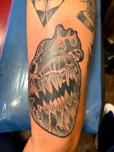 Explore knee surgery tattoo ideas, creative tattoo ideas in Cape Coral, available at UNRIVALED INK