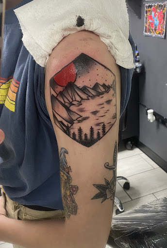 Explore nostalgia tattoo ideas, creative tattoo ideas in Cadillac, available at Limitless Ink Tattoo Studio