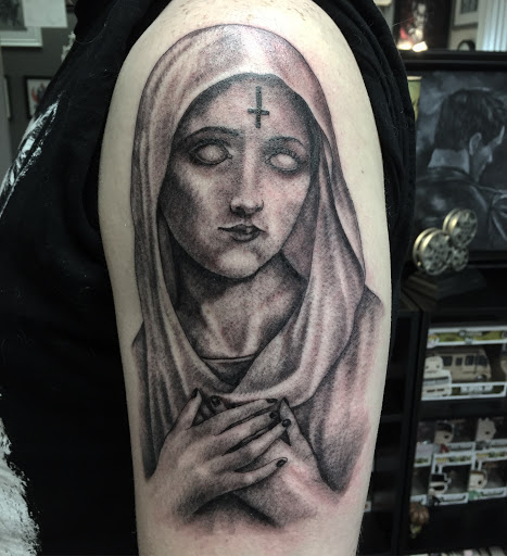 Explore praying hands tattoo ideas, creative tattoo ideas in Clarksburg, available at Art & Soul Studio Of Tattoo