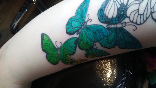 Explore tattoo son ideas, creative tattoo ideas in Wasilla, available at Cynful Ink and Metal