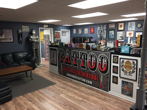 Explore koi fish tattoo ideas, creative tattoo ideas in Mchenry, available at Lunchbox Tattoo and Body Piercing