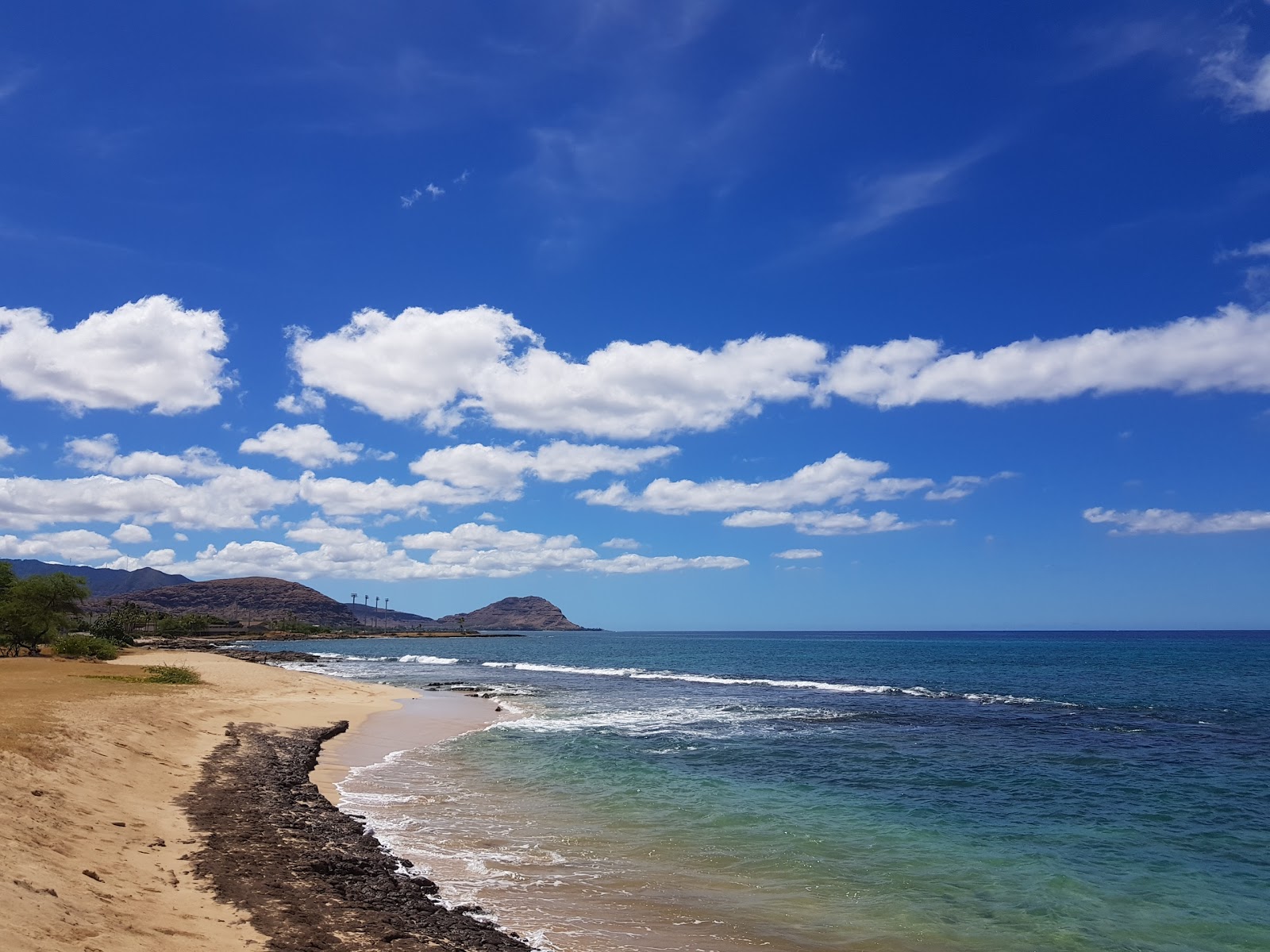 Foto van Mauna Lahilahi Beach Park met ruime baai