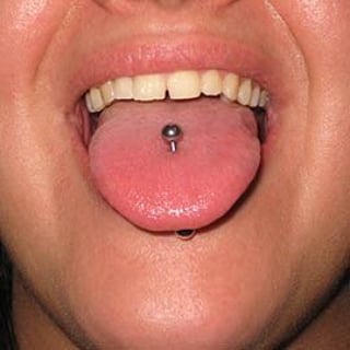 Explore bite me tattoo ideas, creative tattoo ideas in Elko, available at Tom Custom Tattoos and Body Piercing Studio