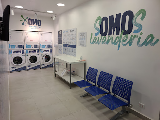 Logo da empresa - OMO Lavanderia Self-Service Guarujá