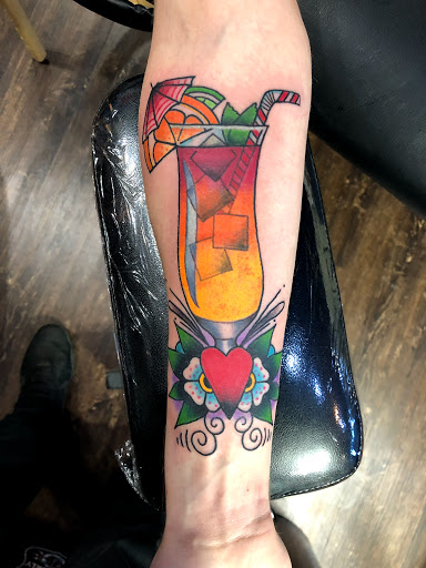 Explore calf sleeve tattoo ideas, creative tattoo ideas in Sioux Falls, available at Permanent Addictions