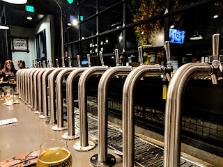 A row of beer taps