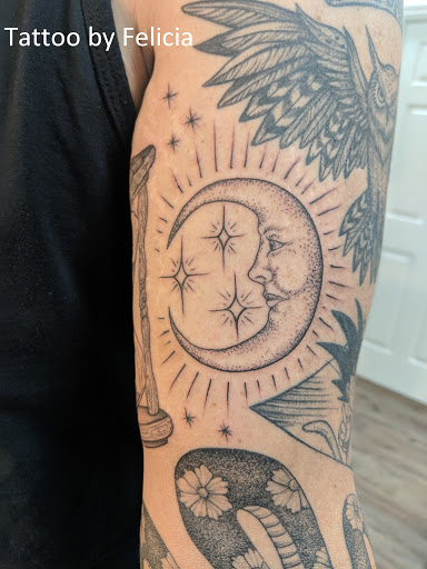 Explore tattoo ideas for black men, creative tattoo ideas in Fort Myers, available at Tiger Lotus Tattoo and Piercing