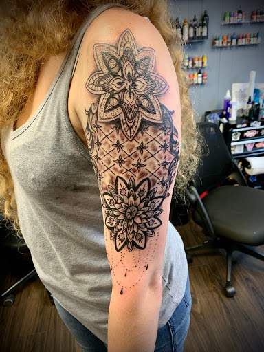 Explore men's inner bicep tattoo ideas, creative tattoo ideas in Gadsden, available at Zekez Inkz Tattoos & Piercings
