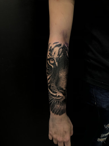 Explore back of the leg tattoo ideas, creative tattoo ideas in Addison, available at Cat Tattoo