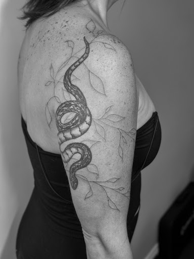 Explore dance tattoo ideas, creative tattoo ideas in New Philadelphia, available at Divine Ink Studio