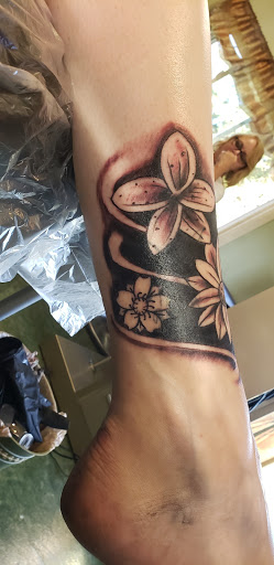 Explore nail tech tattoo ideas, creative tattoo ideas in Hattiesburg, available at Sinful Aart Tattoo