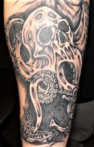 Explore irish cross tattoo ideas, creative tattoo ideas in Muscatine, available at Stigma Tattoo & Body Piercing