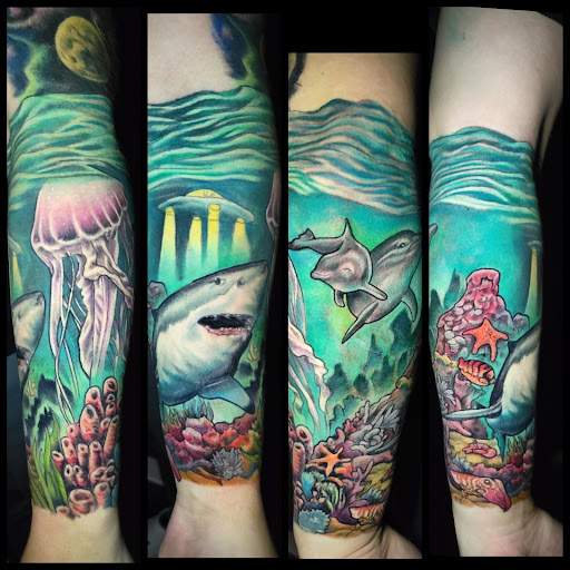 Find space tattoo ideas for your next unique tattoo in Buford at Inked Arts Tattoo Studio