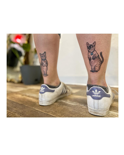 Explore february birth flower tattoo ideas, creative tattoo ideas in Moline, available at ARTIST AIMEE TATTOOS - AF Tattoo Studio