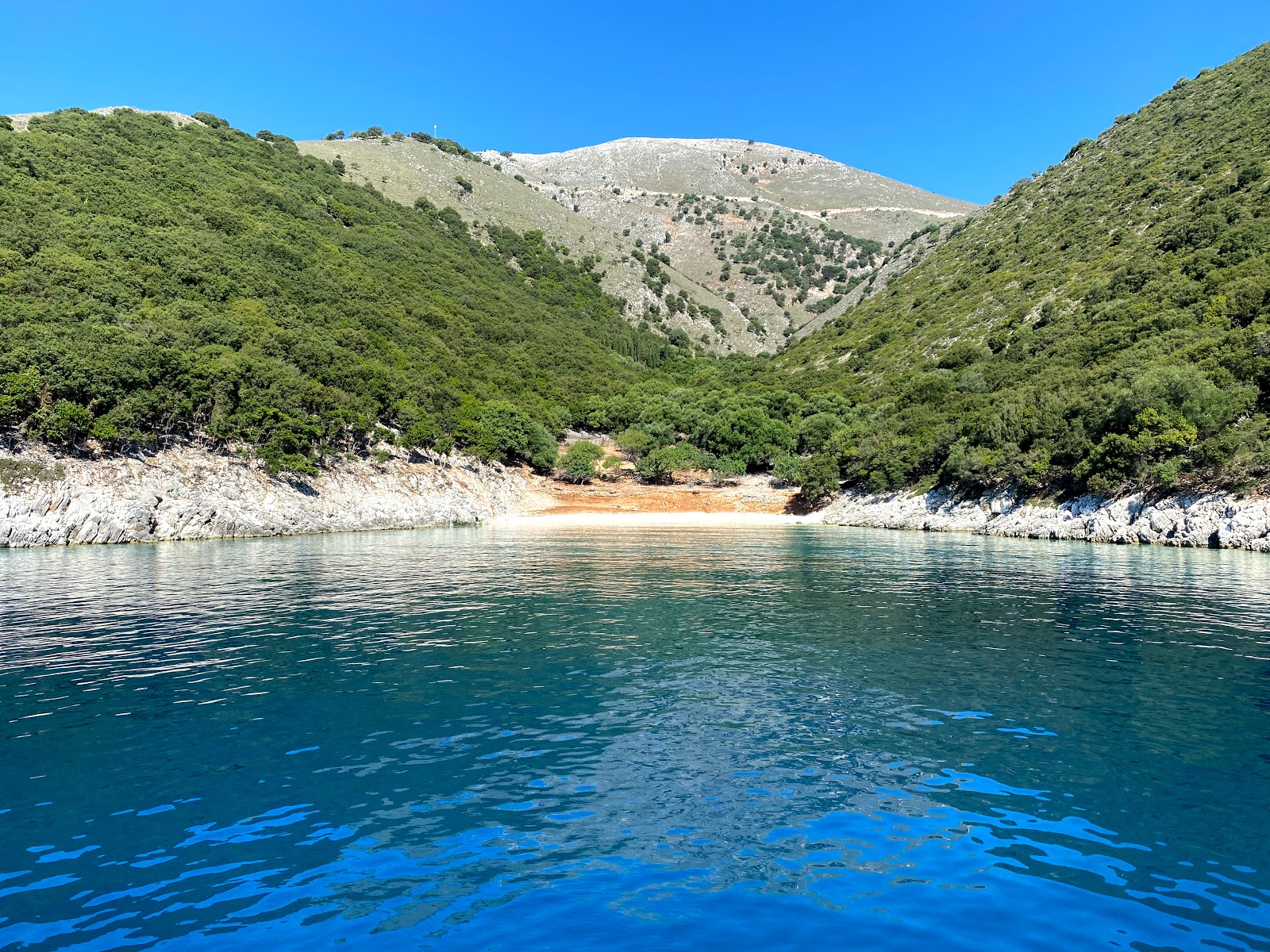 Photo de Kapsolimionas beach avec caillou fin clair de surface