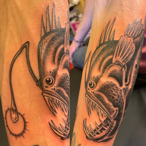 Explore money bag tattoo ideas, creative tattoo ideas in Boulder, available at Rising Tide Tattoo Emporium