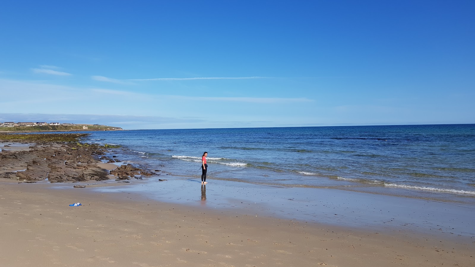 Keiss Beach'in fotoğrafı turkuaz saf su yüzey ile