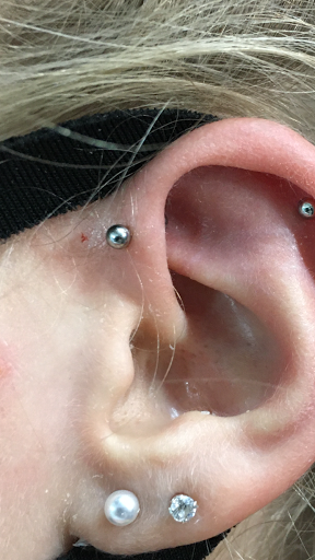 Explore doom tattoo ideas, creative tattoo ideas in San Antonio, available at Adrenaline Tattoo & Body Piercing