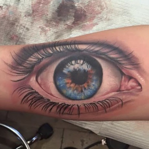 Explore cover up tattoo ideas female back, creative tattoo ideas in College Station, available at Legacy Tattoo Lounge