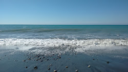 Foto von Canada Rodeo beach mit lange, gerade küste
