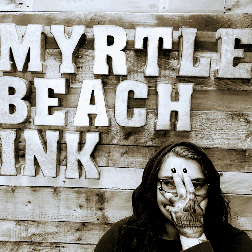 Explore music tattoo ideas for females, creative tattoo ideas in Myrtle Beach, available at Myrtle Beach Ink