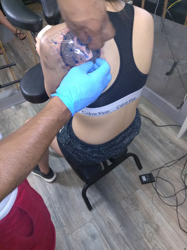 Explore hip tattoo ideas for women, creative tattoo ideas in Atlanta, available at Iron Palm Tattoos & Body Piercing Atlanta