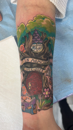 Explore hitchhiker's guide to the galaxy tattoo ideas, creative tattoo ideas in East Rochester, available at Spice City Tattoo