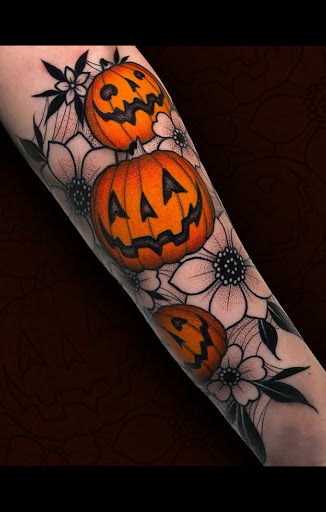Explore kiss band tattoo ideas, creative tattoo ideas in Rome, available at Artistic Edge Tattoo