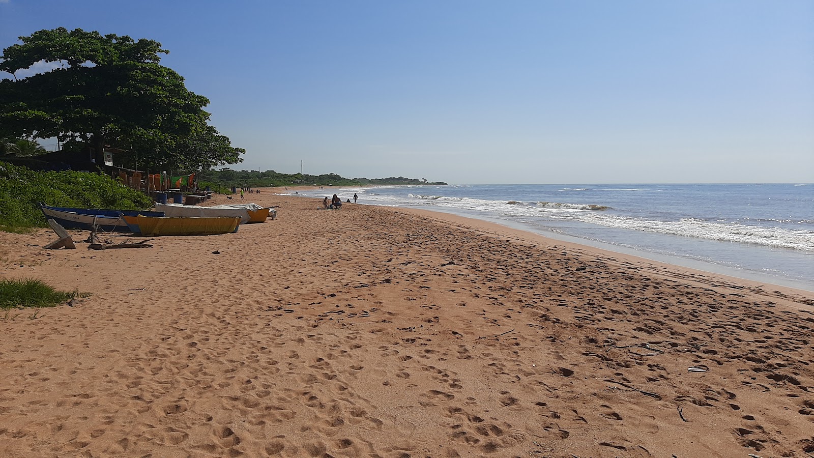 Foto av Manguinhos stranden och bosättningen