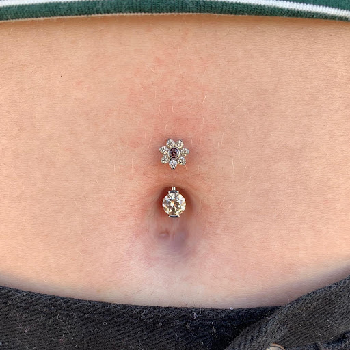 Explore fish tattoo ideas for females, creative tattoo ideas in Aurora, available at Bespoke Piercing & Jewelry (Inside Bonaroo Tattoo)