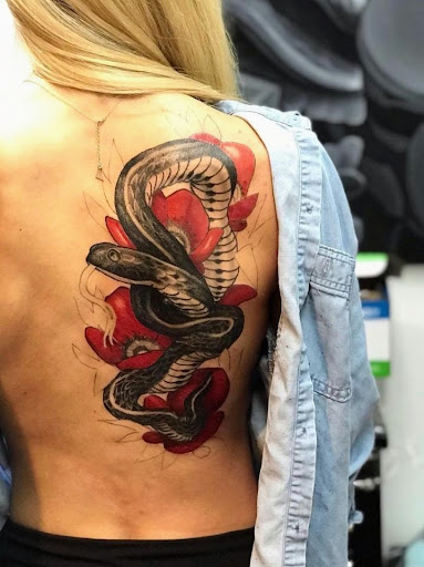 Explore black and white voodoo/ragdoll broken heart tattoo ideas, creative tattoo ideas in Spokane, available at Feel Good Ink