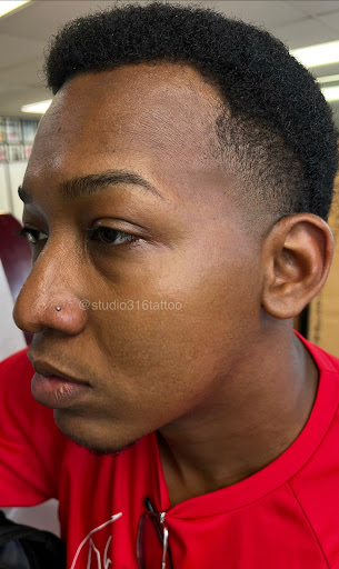 Explore flower arm tattoo ideas, creative tattoo ideas in Jackson Heights, available at studio 316 Tattoo & Body Piercing