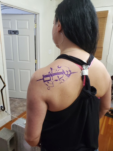 Explore religious tattoo ideas, creative tattoo ideas in Longview, available at Burning Rock Tattoo