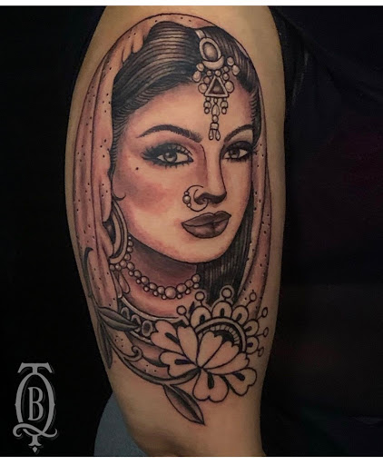 Explore moon tattoo ideas for guys, creative tattoo ideas in Marietta, available at The Queen Bee Tattoo and Piercing Parlour