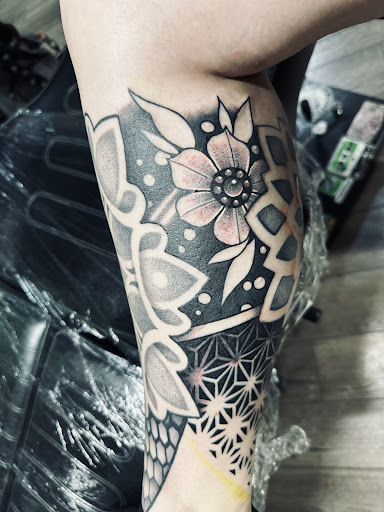 Explore cute foot tattoo ideas, creative tattoo ideas in Cheyenne, available at The T.R.I.B.E. Zoo, LLC Tattoo