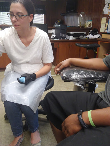 Explore fingerprint tattoo ideas, creative tattoo ideas in Elizabeth City, available at Wolfs Den Custom Tattoo & Body Piercing Studio