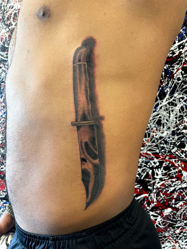 Explore african warrior tattoo ideas, creative tattoo ideas in Palm Harbor, available at Angry Owl Tattoo and Piercing