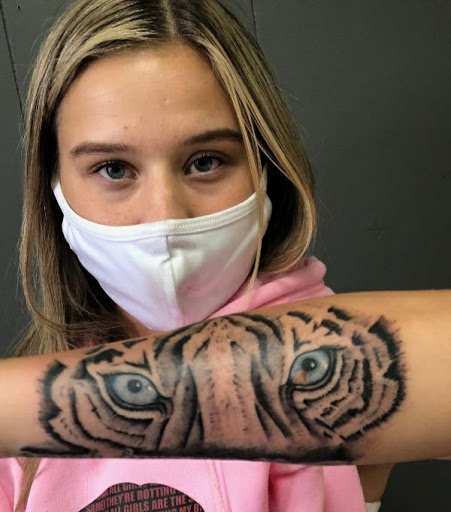 Explore small book tattoo ideas, creative tattoo ideas in Romulus, available at Urban Rituals Piercing and Tattoo