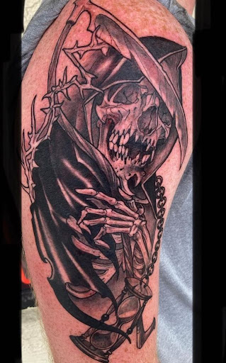 Explore aot tattoo ideas, creative tattoo ideas in Largo, available at Alchemy Tattoos and Body Piercings