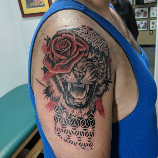Explore tattoo ideas for birthdays, creative tattoo ideas in New Bern, available at Ol Skool Tattoos