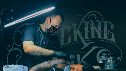 Explore athletic tattoo ideas, creative tattoo ideas in Kailua Kona, available at Packing Ink Tattoos