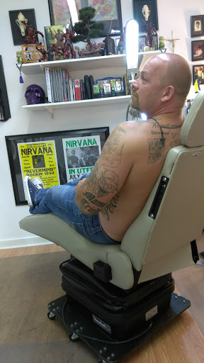 Explore rose tattoo idea, creative tattoo ideas in Anniston, available at Artistic Addictions