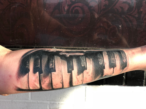 Explore autism puzzle piece tattoo ideas, creative tattoo ideas in Saint Petersburg, available at Cthulhu Tattoo & Body Piercing