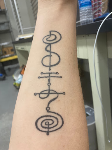 Explore throat tattoo ideas for females, creative tattoo ideas in Syracuse, available at Cordero Collective Tattoos