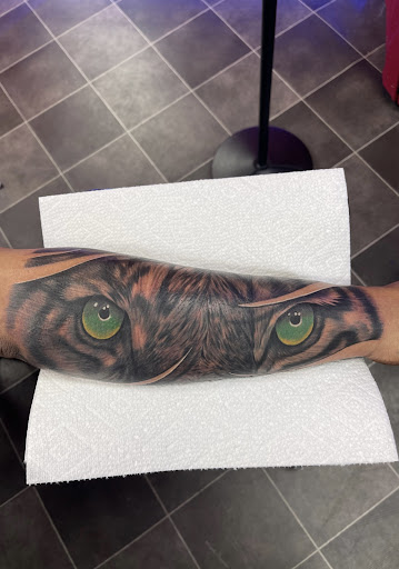 Explore tattoo name ideas on arm, creative tattoo ideas in Richmond, available at Captured Moment Tattoos