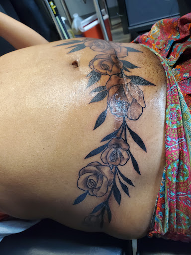 Explore chest piece tattoo ideas woman, creative tattoo ideas in Riverview, available at Believers Ink
