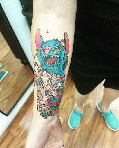 Explore tattoo ideas for women sleeve, creative tattoo ideas in Cocoa, available at Rorschach Tattoo Shop and Piercing Studio