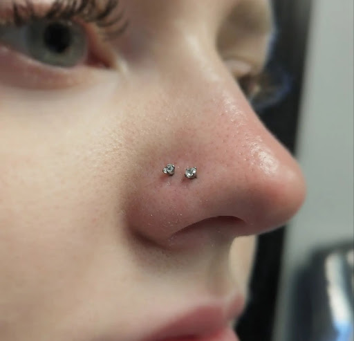 Explore red tattoo ideas, creative tattoo ideas in Roselle, available at Atmosphere Tattoo Gallery - Roselle