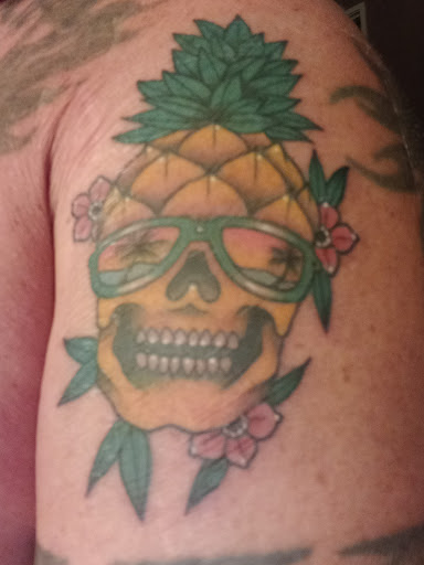 Explore back tattoo ideas for guys, creative tattoo ideas in Honolulu, available at Sacred Art Tattoo Waikiki