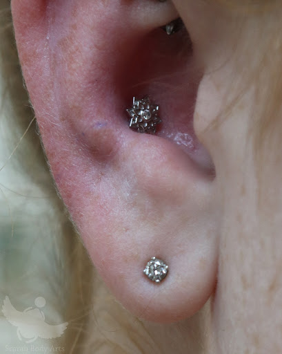 Explore free spirit tattoo ideas, creative tattoo ideas in Syracuse, available at Scarab Body Arts